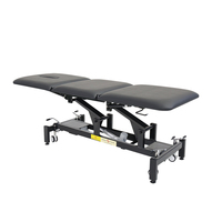 Mesa terapéutica negra de 3 secciones Mesa de masaje de cama de fisioterapia eléctrica