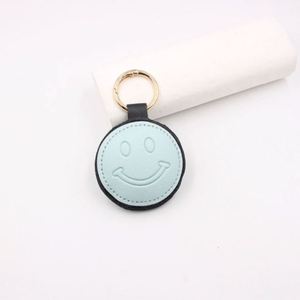 Porte-clés rond en cuir PU, breloque de sac élégante et durable, pendentif coloré et portable, cadeau promotionnel - Product Image 2