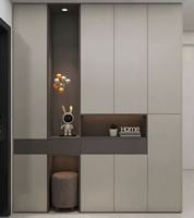 Armoire modulaire gain de place avec compartiments dissimulés et niche de présentation décorative pour petits appartements