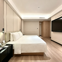 Ensemble de mobilier de chambre d'hôtel de luxe moderne de style chinois, avec panneau mural entièrement rembourré, tête de lit capitonnée et sommier pour projet