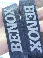 Fabricantes de Bandas Elásticas de nailon con logotipo personalizado al por mayor cinturón elástico en relieve negro correas elásticas de poliéster para sombreros de peluca