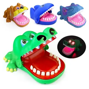 Gran cocodrilo mordedura dedo juguete dinosaurio diente extracción padre-hijo juego niños broma tiburón