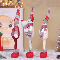 Poupée elfe rayée de Noël avec chapeau et bottes de Père Noël - Jouet amusant et décoration pour la maison.