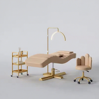 Lit de massage pour sourcils moderne en cuir blanc avec base dorée, hauteur réglable, lit de luxe pour cils et soins du visage, en promotion