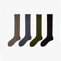 Chaussettes mi-mollet personnalisées en gros, couleur unie, douces et respirantes, en coton peigné pour femmes, chaussettes hautes jusqu'au genou, OEM ODM, couleur personnalisable