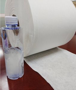 Lingettes <span class=keywords><strong>de</strong></span> <span class=keywords><strong>toilette</strong></span> jetables Lingettes humides pour bébé Matière première Tissu non tissé jetable en relief 100% cellulose - Product Image 1