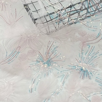 Tissu en maille florale 3D en polyester 100 % avec broderie de sequins scintillants, vente en gros d'usine