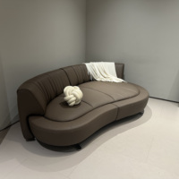 Canapé en cuir Salon Nouvelle fonction minimaliste italienne Designer Dossier de forme spéciale Canapé rotatif sur rail