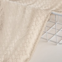 Tissu de doublure en satin jacquard de polyester XMH pour les acheteurs du Koweït, du Qatar et d'Oman, non conducteur, 95 g/m², toucher doux