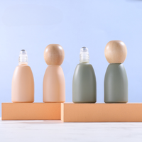 Morandi 12ml Roller Ball Bouteille Couverture en bois de hêtre Sous-bouteille en verre coloré Parfum Huiles essentielles Sérigraphié