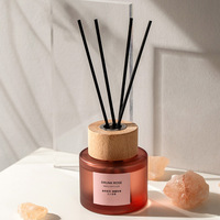 Bouteille de diffuseur de roseau d'arôme d'air de luxe de parfum carré de 50ml 100ml 150ml avec le chapeau en bois