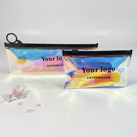 Vente en gros Kit de voyage en PVC Sac d'emballage brosse à dents en plastique Sac holographique de luxe pochettes de maquillage Transparent PVC sac cosmétique