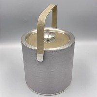 Seau à glace en acier inoxydable de 1,3 L pour hôtels et bars, avec pince à glace, style minimaliste et rétro.