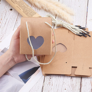 Boîte cadeau en papier Kraft à poignée Portable, 1 pièce, avec fenêtre transparente en forme de cœur, avec corde, pour décoration de mariage, de noël, petits gâteaux, biscuits pour enfants - Product Image 1