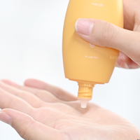 Bouteille de crème solaire en plastique ovale écologique de 30 ml, 45 ml, 50 ml avec triple protection UV et impression sérigraphique pour les soins de la peau
