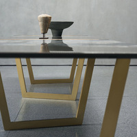 Table à manger pliante en marbre minimaliste italien Baxter avec pieds en métal et ensemble de chaises de luxe pour salle à manger au sol plat extra-longue