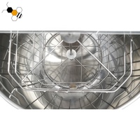 Extracteur de miel centrifuge manuel à 4 cadres avec construction en acier inoxydable et fonctionnement facile