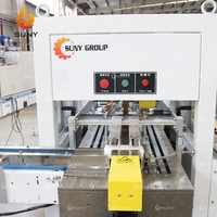 Machine d'emballage automatique multi-paquets fonctionnant avec une machine de fabrication et d'emballage de lingettes humides