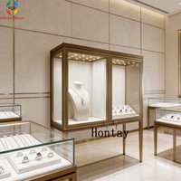 Vitrine de luxe personnalisée pour bijoux, en acier inoxydable, double porte, éclairage LED, finition dorée, robuste, étanche, sécurisée, haute performance