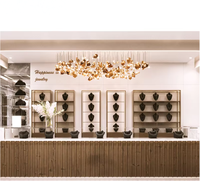 Vitrine et comptoir de présentation de bijoux en verre et acier inoxydable, éclairage LED de haute qualité, respectueux de l'environnement, personnalisable