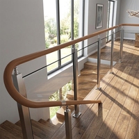 Escalier en colimaçon moderne sur mesure en alliage d'aluminium pour intérieur, avec garde-corps en verre et balustrades courbes résistantes à la rouille pour revêtement de sol