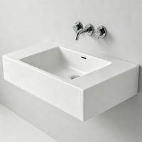 Lavabo mural en marbre à surface solide pour hôtel, avec traitement de polissage, design moderne écologique, robinet monotrou
