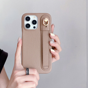 เคสโทรศัพท์หนังเทียมสำหรับไอโฟน พร้อมขาตั้งแบบเส้นและสายคล้องโทรศัพท์ ดีไซน์สีพื้น - Product Image 4