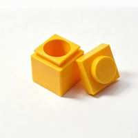 Contenant vide en PP de 10g (0,34oz) en forme créative de blocs empilables pour baume à lèvres, protection des lèvres, marque privée