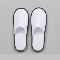 Chaussons d'hôtel jetables antidérapants en tissu éponge pour les commodités de voyage