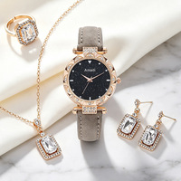 Montre raffinée pour femme avec cadran rond de 33 mm, bracelet en PU, collier, bague et boucles d'oreilles serties de strass carrés