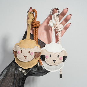 Llavero de PU con diseño de oveja de dibujos animados, adorno de cuero de oveja con cuerda trenzada, amuleto para bolso, en stock, Año de la Oveja 2027 - Product Image 3