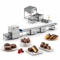 Machine automatique d'enrobage au chocolat pour noix, amandes et cacahuètes, pour la production de snacks.