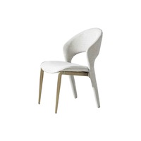 Chaise de salle à manger contemporaine minimaliste avec structure métallique, revêtement en tissu bouclé doux, design ergonomique pour appartements et salles à manger.