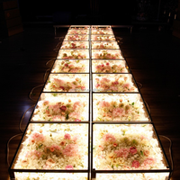 Plateforme de scène LED pour mariage et fête, avec fleurs lumineuses sur un sol de danse en verre trempé à effet 3D SIMPSON