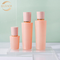 Bouteilles cosmétiques en verre rose de 30 ml, 100 ml, 120 ml en gros avec anneaux dorés pour toniques, essences, lotions et crèmes de nuit