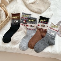 Chaussettes longues pour femmes en laine chaude Fair Island mi-mollet, épaisses et en polaire, mignonnes avec un chiot, pour l'automne et l'hiver