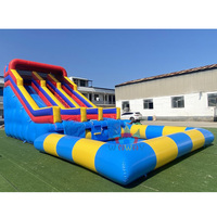 Toboggan aquatique gonflable commercial à double piste avec piscine intégrée, chute humide et sèche, en PVC sur mesure pour la location événementielle et les carnavals