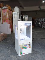 Mini machine à griffes à monnayeur économique pour la Malaisie, type grue à jouets, en métal trempé, vente en gros usine
