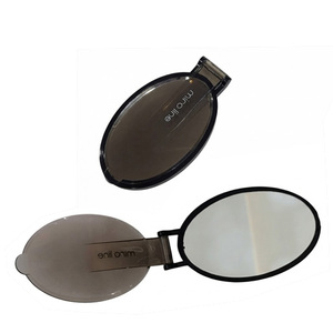 Travel Compact Oval <b>Vanity</b> <b>Mirror</b> <b>With</b> custom Logo As Perfect Gift For Promotional Merchandising Campaigns - Product Image 1