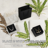 Boîte à bijoux rigide recyclable en noir et blanc uni pour montres, bracelets, colliers, boucles d'oreilles, bagues