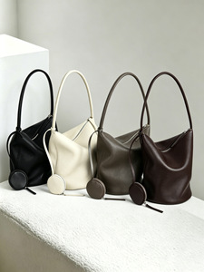 Sac seau minimaliste et décontracté en cuir <span class=keywords><strong>de</strong></span> vachette premium avec pochette à monnaie ronde détachable, sac hobo chic et urbain - Product Image 1