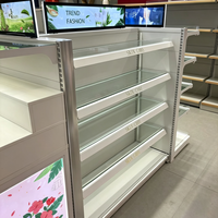Étagères de présentation pour supermarchés, système de rayonnage métallique LED pour magasins de maquillage et cosmétiques, étagères blanches à niveaux avec embouts.