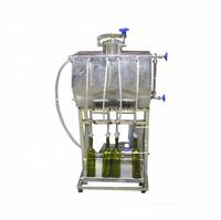 Machine de remplissage liquide à 4 têtes linéaire à petite gravité pour vin whisky eau pure bouteilles de jus d'alcool pour animaux de compagnie matériau en verre plastique