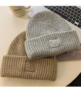 Bonnet d'hiver pour femme, style coréen, bonnet en tricot ample, bonnet chaud avec rabat pour les oreilles, bonnet en tricot doux, bonnet d'hiver décontracté pour femme