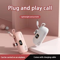 Mini Power Bank 2-en-1 5000 mAh pour Téléphone – Vente en Gros, Power Bank Capsule avec Câbles Intégrés, Batterie d'Urgence pour l'Extérieur