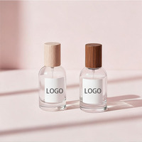 Flacon de parfum élégant de 50ml avec pulvérisateur et bouchon en bambou Récipients de maquillage Flacon de parfum rond en verre