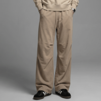 Pantalon de survêtement large pour homme avec cordon de serrage élastique à la taille, détail froncé aux genoux, bande latérale, coupe décontractée épaisse, personnalisable avec logo