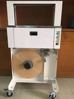 Machine à sangler automatique pour billets de banque, coffret de papiers, emballage
