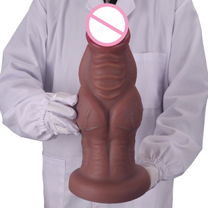 Delove Monster Dildo - Marron/Violet, étanche, tailles S-XXL, forme de pieuvre, ventouse, sans vibration, matière douce pour femmes - Product Image 1