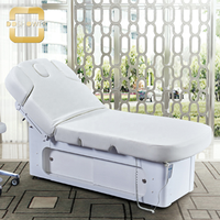 Lit de massage médical à hauteur réglable de clinique Beauté du dossier chauffant pour 4 moteurs Fournisseur de table de traitement de spa électrique complet
